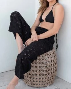 Daisy Eyelet Coverup Pant 12 Daisy Eyelet Coverup Pant -Mersea womens black eyelet coverup pant side view lounging