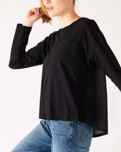Moderne Pocket Crewneck Tee -Mersea womens black front pocket pleated back crew neck long sleeve tee side view movement front pocket detail
