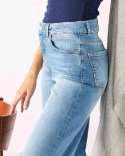 Nomad Relaxed Wide Leg Jean 8 Nomad Relaxed Wide Leg Jean -Mersea womens blue wash relaxed wide leg side view close up pocket detail