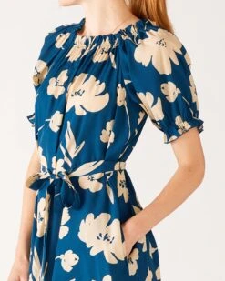 Ibiza Dress 19 Ibiza Dress -Mersea womens floral navy blue ruffled shoulder midi dress side view waist pocket detail