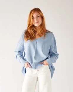 Toujours V-neck Sweater -Mersea womens light blue everyday high low waist jersey knit pullover v neck troujour sweater front view hands in pockets