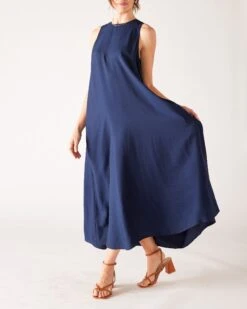 Passport Maxi Dress -Mersea womens navy maxi dress front view swing drape