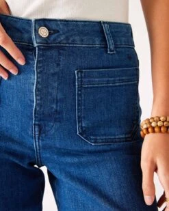 Nomad Cropped Sailor Jean 15 Nomad Cropped Sailor Jean -Mersea womens patch pocket stretchy cropped wide leg blue jeans front view close up patch pocket detail