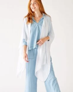 Nellie Wrap -Mersea womens white breathable lightweight fringe hem multi functional nellie travel wrap front view shoulder drape