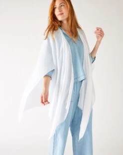 Nellie Wrap -Mersea womens white breathable lightweight fringe hem multi functional nellie travel wrap side view