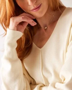 Toujours V-neck Sweater -Mersea womens white everyday high low waist jersey knit pullover v neck troujour sweater close up front view