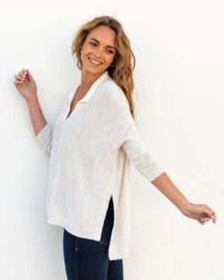 Catalina Polo Sweater 31 Catalina Polo Sweater -Mersea womens white heathered collared v neck polo sweater flowing side view