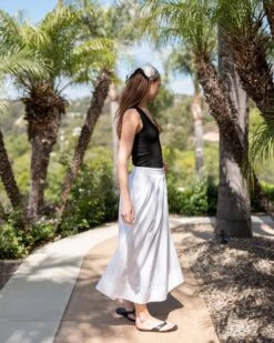 Sonnet Maxi Skirt -Mersea womens white maxi skirt side view travel