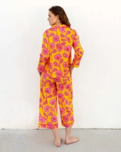 Over The Cotton Moon Pajama Set - Poppies 10 Over The Cotton Moon Pajama Set - Poppies -Mersea womens yellow pink poppy print wide legged pajama set with pockets and ribbon tie rear view